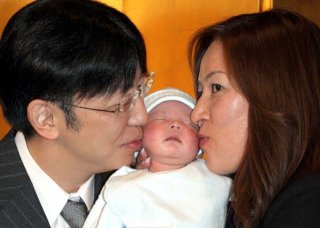 ジャガー横田夫妻（C）日刊ゲンダイ